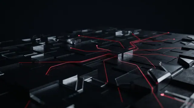 Thin red routes connecting distant points across a dark landscape at night